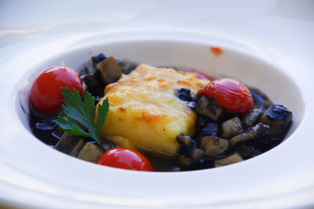 Kukuriku Restaurant in Kastav - Grana Padano Polenta mit Tintenfisch im eigenen Sud